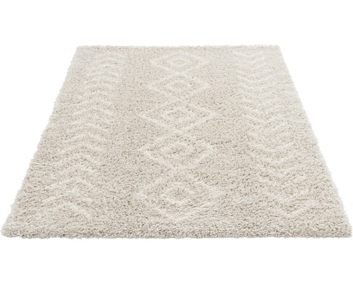 Beiger Teppich mit Muster