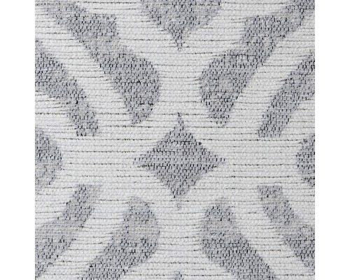 Nahaufnahme eines Teppichmusters mit geometrischen Formen