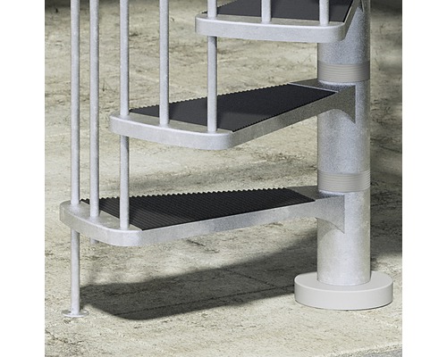 Detailansicht einer Spindeltreppe mit Stahlstufen und Geländerstäben