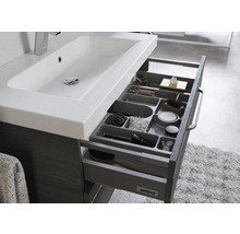 Badezimmerschrank mit Waschbecken und Schubladen mit Fächern zur Aufbewahrung