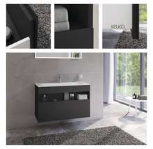 Modernes Badezimmer mit Waschbeckenunterschrank und Ablageflächen.