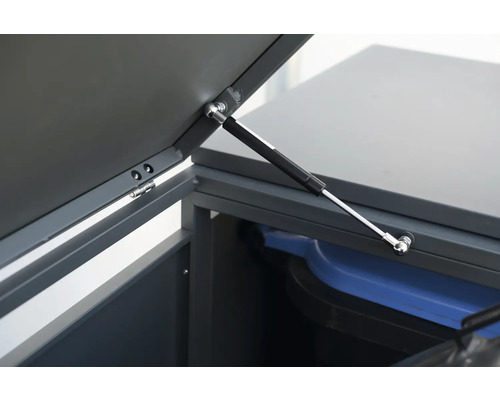 Detailansicht einer Mülltonnenbox mit geöffnetem Deckel und Gasdruckfeder