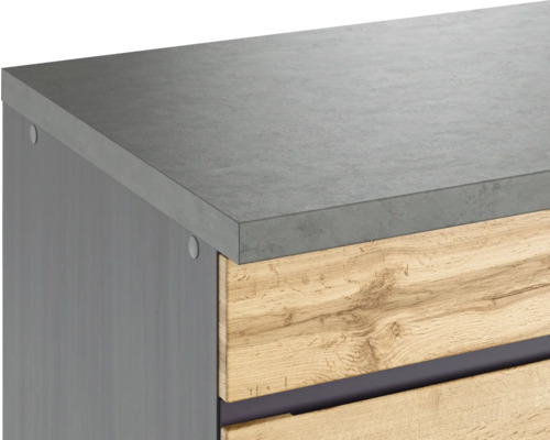 Detailansicht eines Badezimmerschranks mit grauer Arbeitsplatte und Holzschubladen