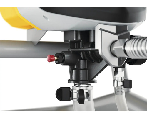 Detailansicht einer Farbspritzanlage mit schwarzem Regler und roten Entlüftungsknopf