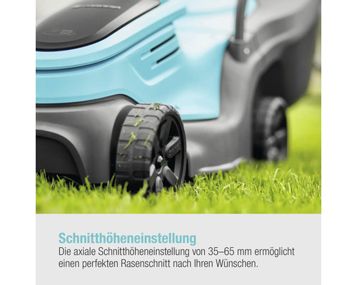 Detailaufnahme eines Rasenmähers auf Rasen