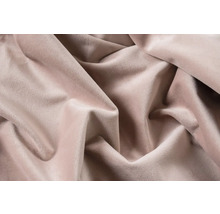 Nahaufnahme von beigefarbenem Veloursstoff in Falten