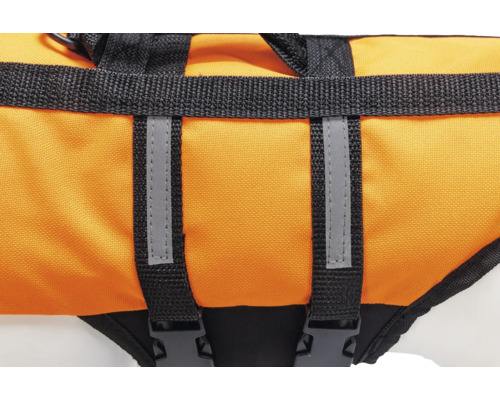 Detail einer Schwimmweste für Hunde mit Griff und reflektierenden Streifen