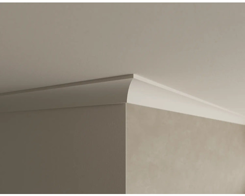 Detailaufnahme einer Deckenleiste an der Wand