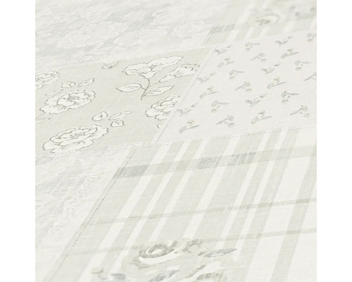 Nahaufnahme einer Tapete mit verschiedenen floralen und geometrischen Mustern