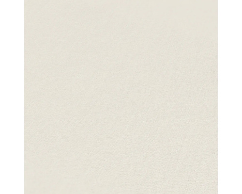 Nahaufnahme einer strukturierten, hellen Tapete.