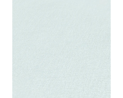 Nahaufnahme einer hellen Textiltapete mit leichter Struktur