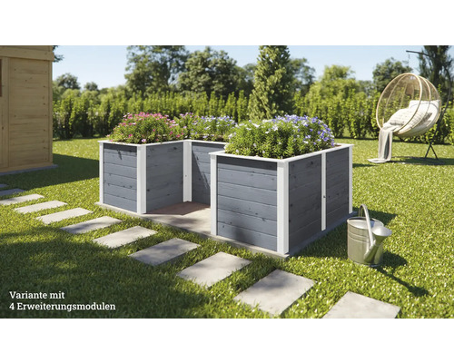 Zwei graue Hochbeete aus Holz mit Erweiterungsmodulen im Garten.