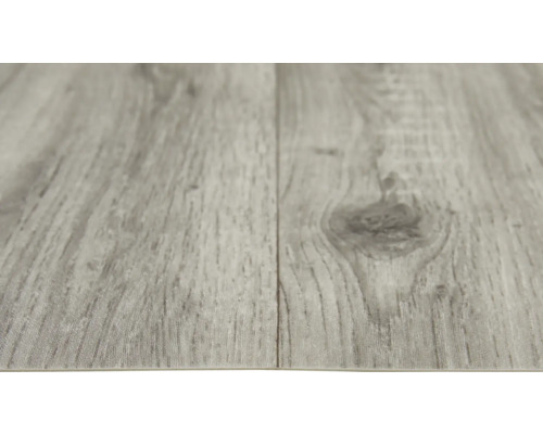 Nahaufnahme von zwei grauen Vinylbodenplatten mit Holzstruktur