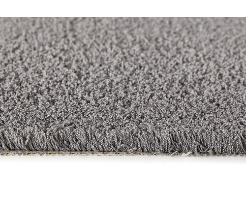 Nahaufnahme eines grauen Teppichs