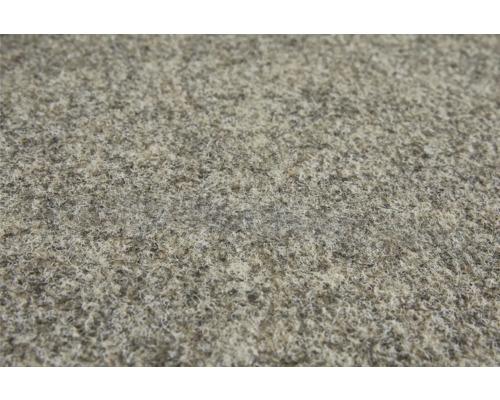 Nahaufnahme eines beigen Teppichs