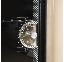Detailansicht des Temperaturreglers eines Ofens mit Temperaturbereich von minimal bis maximal