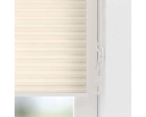 Nahaufnahme einer beigen Fensterplissee-Jalousie mit Bedienung