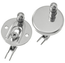 Zwei Toilettensitzbefestigungen aus Metall