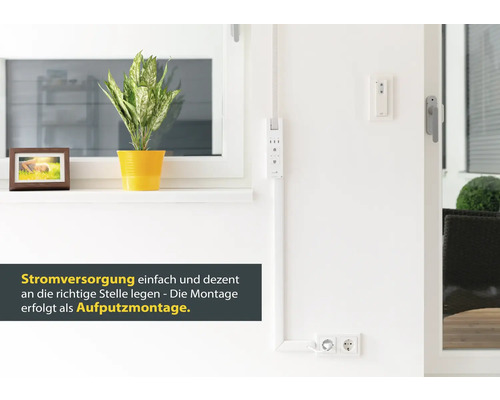 Aufputz Stromversorgung mit Kabelkanal und Steckdosen in einem hellen Raum.