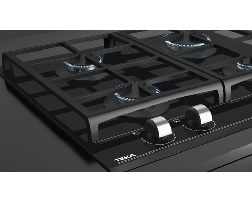 Schwarzer Teka Gaskochfeld mit vier Brennern und silberfarbenen Knöpfen