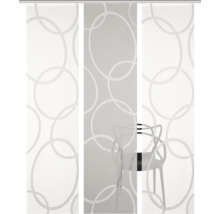 Schiebegardine mit Kreismuster vor einem Stuhl