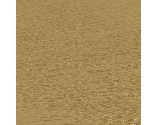 Nahaufnahme einer goldfarbenen Strukturtapete.