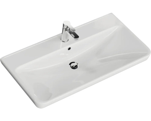 Weißes Keramik Waschbecken mit Armatur