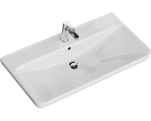 Weißes Keramik Waschbecken mit Armatur