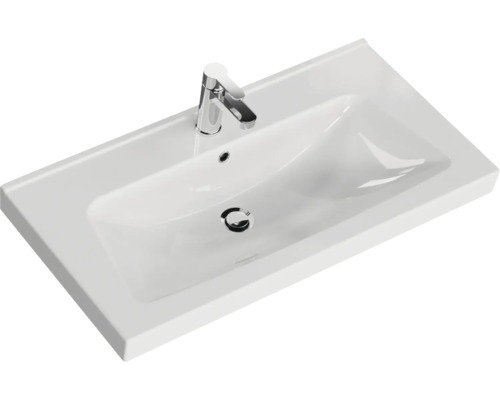 Waschtisch aus Keramik mit Armatur