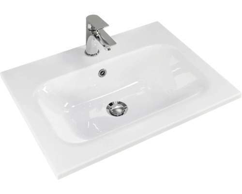 Waschtisch aus Keramik mit Armatur