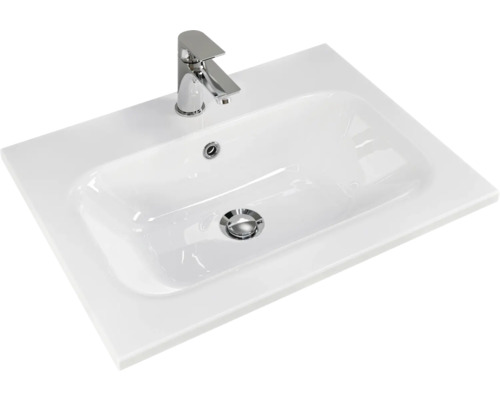 Waschtisch aus Sanitärkeramik mit Armatur