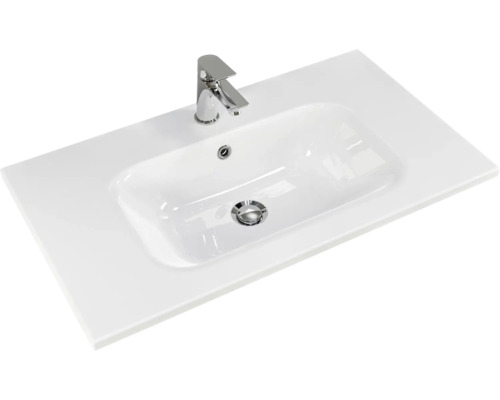 Weißes Aufsatzwaschbecken mit Armatur