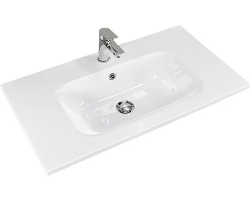 Waschtisch mit Armatur und rechteckigem Becken