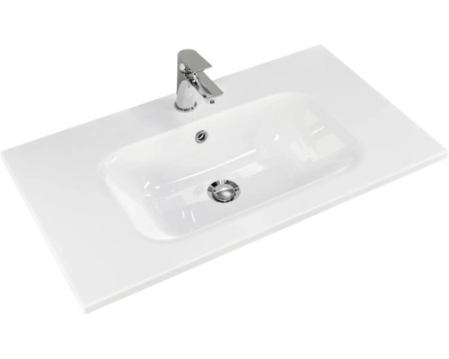 Waschtisch mit Armatur und rechteckigem Becken