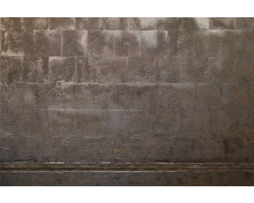 Nahaufnahme einer strukturierten Wand mit quadratischen Mustern.