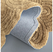 Getufteter Teppich mit gewundenem Design und rutschfester Rückseite