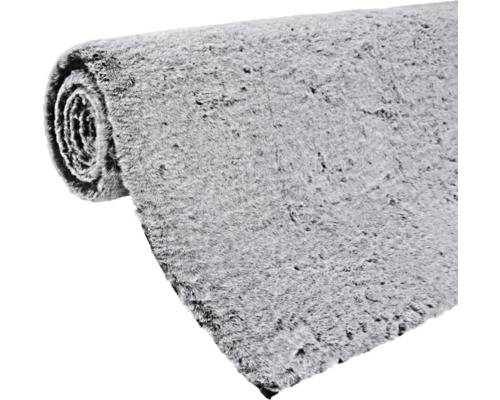 Grau gerollte Teppichbrücke