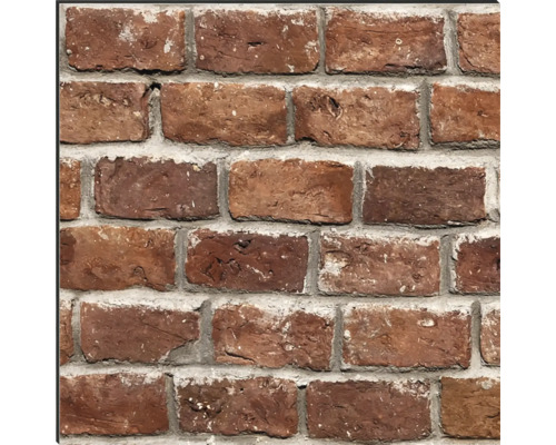 Nahaufnahme einer Wand mit roten Ziegeln und grauem Mörtel.