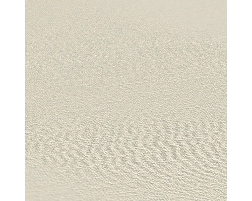 Nahaufnahme einer beigen Vinyltapete mit leichter Textur