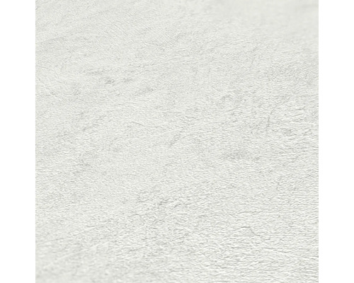 Nahaufnahme einer weißen Vliestapete mit leichter Struktur