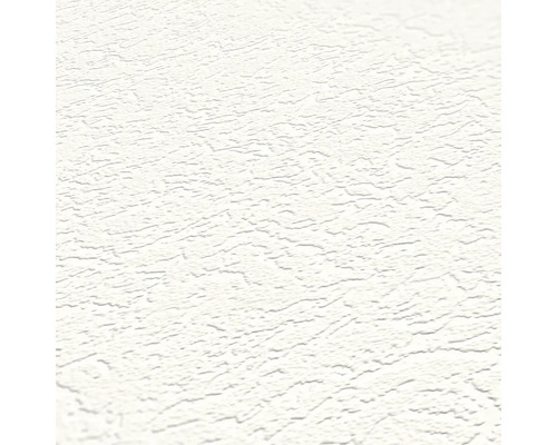 Nahaufnahme einer weißen Rauhfasertapete.