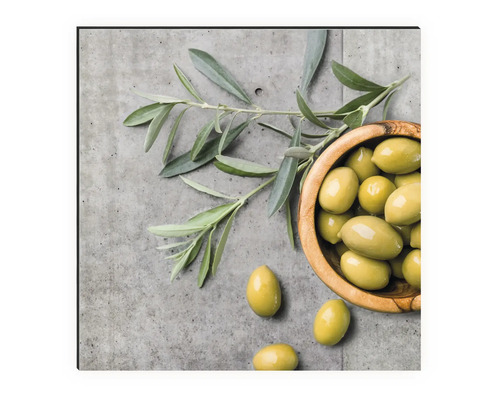 Wandbild mit Oliven in einer Holzschale und Olivenzweig