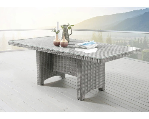 Gartentisch mit Glasplatte und Rattanstruktur