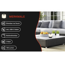 Dekorative Tischleuchte mit Touchdimmer und USB-C Kabel auf einem Gartentisch.