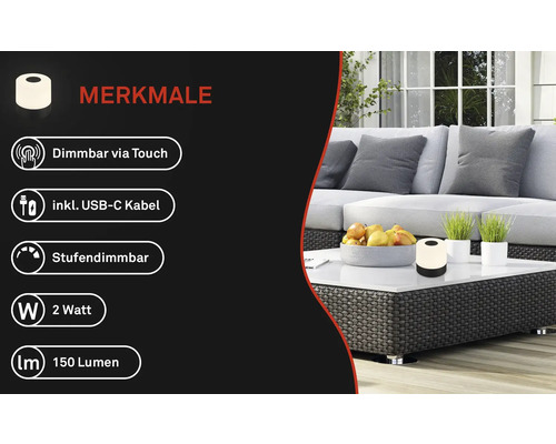 Dekorative Tischleuchte mit Touchdimmer und USB-C Kabel auf einem Gartentisch.