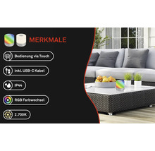 Dekorative RGB-Tischleuchte mit Touchbedienung auf einem Gartentisch