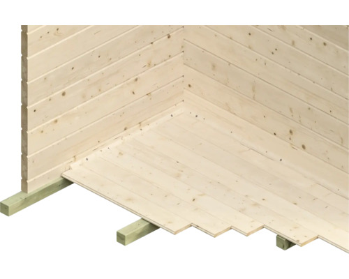 Detailansicht einer Holzwand mit Holzboden auf Balkenkonstruktion