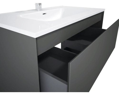 Waschtischunterschrank mit Waschbecken und offenen Schubladen