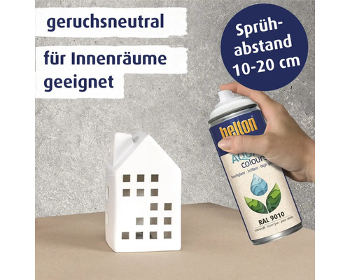 Helton Farbspraydose mit dem Hinweis geruchsneutral und geeignet für Innenräume neben einem Deko Haus
