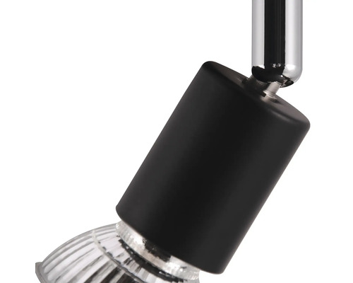 Detail einer schwarzen Strahlerlampe mit silberfarbenem Lampenschirm.